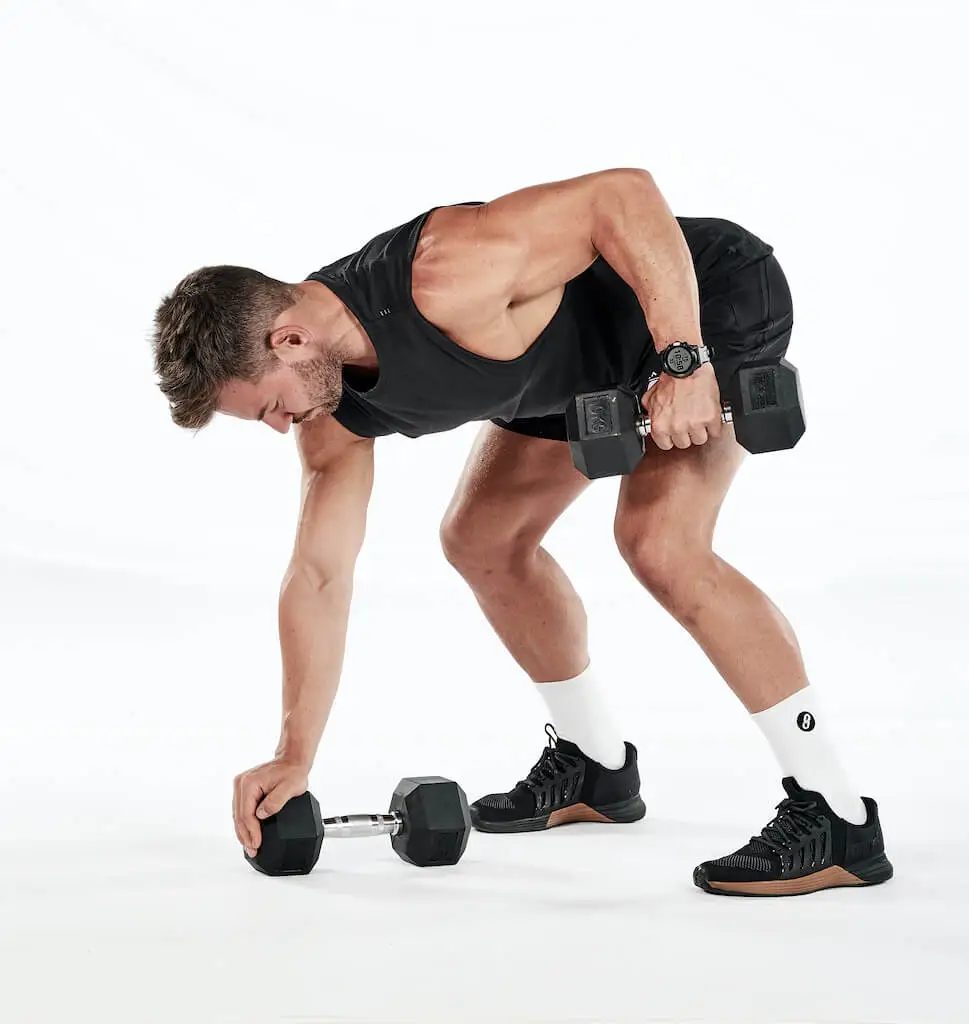 Person training with dumbbells